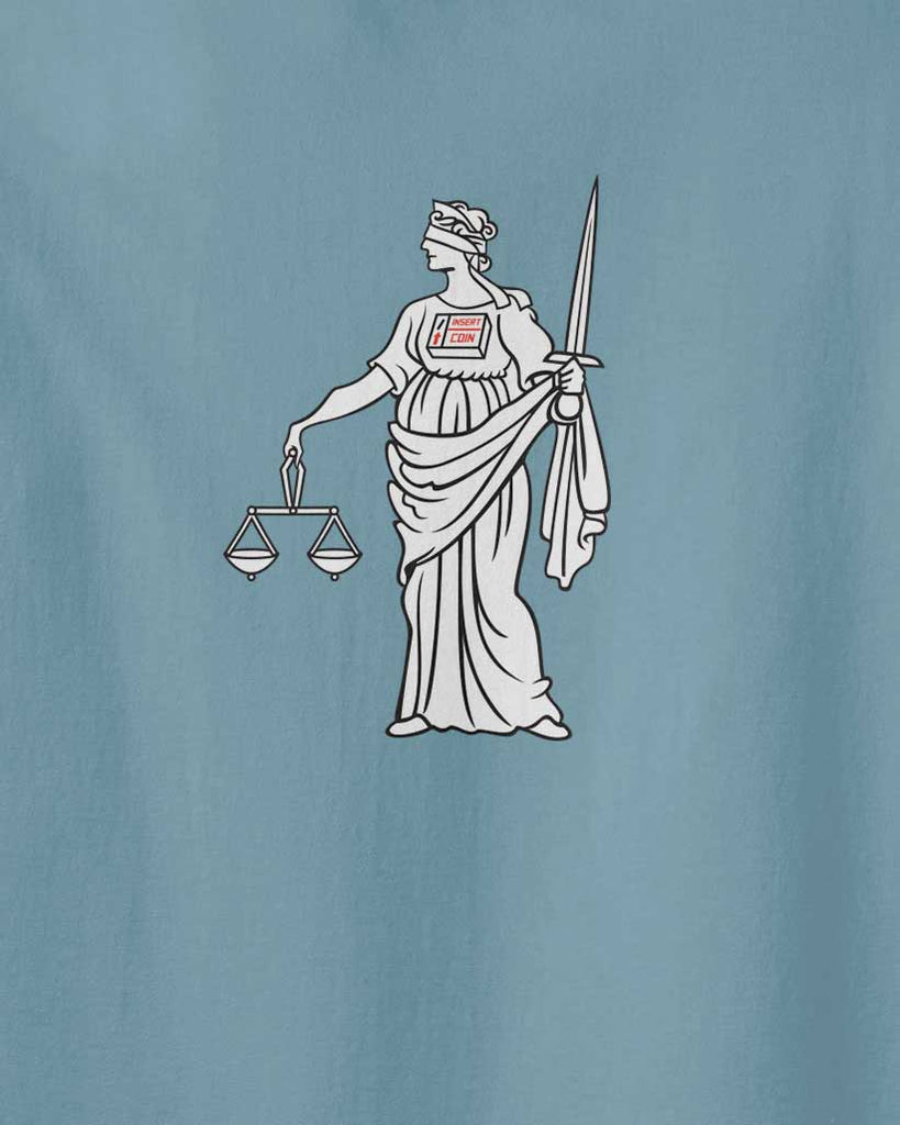 Justice tshirt in blue color, is the graphic of lady justice with a vending machine on the chest and the text: insert the coin 