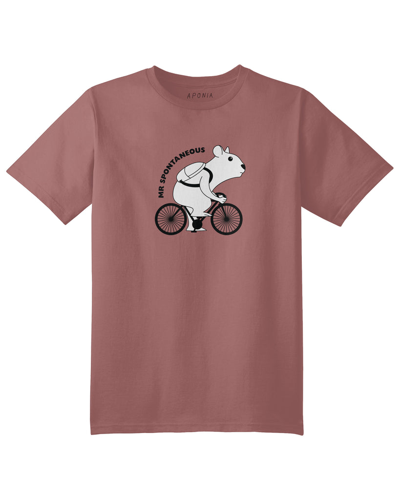 A pink t shirt with a graphic of a hamster ridding his bike and written text of "Mr Spontaneous"